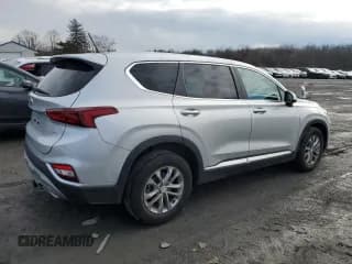 ✅ 2019 Hyundai Santa Fe SE • VIN: 5NMS2CAD2KH117328 • Лот: 38864413. Опубликован ранее на Copart с пробегом 40 968 миль. Бесплатный доступ к архиву аукционных продаж из США и подробный отчёт об истории автомобиля на DreamBid. Изображение 3.
