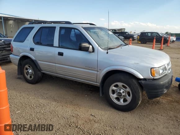✅ 2000 Isuzu Rodeo • VIN: 4S2DM58WXY4336906 • Lot: 69639245. Wystawiony na Copart z przebiegiem 176 214 mil. Bezpłatny archiwum sprzedaży aukcyjnych z USA i szczegółowy raport historii pojazdu na DreamBid. Zdjęcie 4.