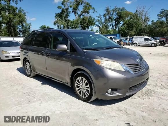 ✅ 2012 Toyota Sienna XLE AAS • VIN: 5TDYK3DCXCS231525 • Lot: 90918155. Listed on Copart with 93,702 mi. Free auction sales archive from the USA and detailed vehicle history report at DreamBid. Image 14.