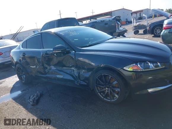 ✅ 2014 Jaguar XF SC • VIN: SAJWA0EX0E8U14421 • Lot: 40380588. Listed on IAAI with 74,345 mi. Free auction sales archive from the USA and detailed vehicle history report at DreamBid. Image 13.