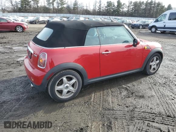 ✅ 2009 MINI Convertible • VIN: WMWMR33589TJ94303 • Lot: 43358885. Listed on Copart with 44,688 mi. Free auction sales archive from the USA and detailed vehicle history report at DreamBid. Image 3.
