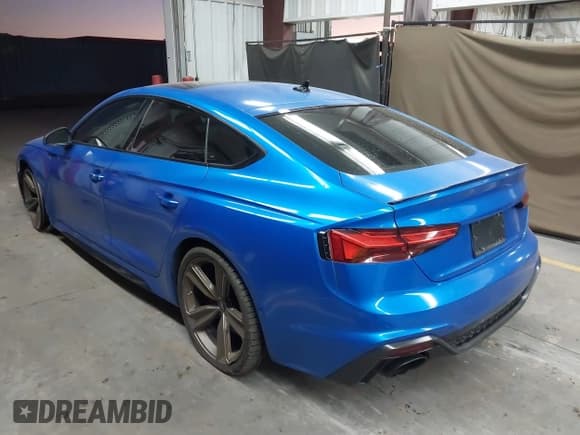 ✅ 2022 Audi RS 5 Sportback • VIN: WUAAWCF51NA902099 • Lot: 43455117. Listed on IAAI with 53,874 mi. Free auction sales archive from the USA and detailed vehicle history report at DreamBid. Image 3.
