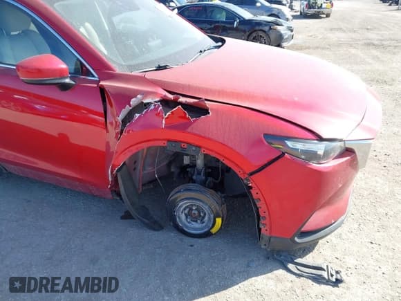 ✅ 2016 Mazda CX-9 Touring • VIN: JM3TCBCY7G0100311 • Lot: 41588448. Listed on IAAI with 115,364 mi. Free auction sales archive from the USA and detailed vehicle history report at DreamBid. Image 6.