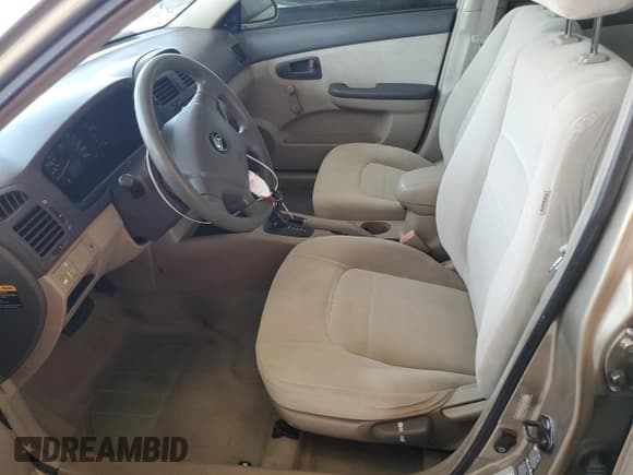 ✅ 2004 Kia Spectra LX • VIN: KNAFE121145030119 • Lot: 59522355. Listed on Copart with 86,264 mi. Free auction sales archive from the USA and detailed vehicle history report at DreamBid. Image 7.