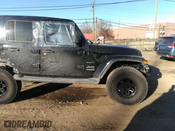 ✅ 2021 Jeep Wrangler Unlimited Sahara • VIN: 1C4HJXEG1MW579887 • Lot: 41299338. Listed on IAAI with 50,707 mi. Free auction sales archive from the USA and detailed vehicle history report at DreamBid. Image 13.