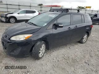 ✅ 2014 Mazda 5 Sport • VIN: JM1CW2BLXE0172753 • Лот: 66478185. Опубликован ранее на Copart с пробегом Не указан. Бесплатный доступ к архиву аукционных продаж из США и подробный отчёт об истории автомобиля на DreamBid. Изображение 1.