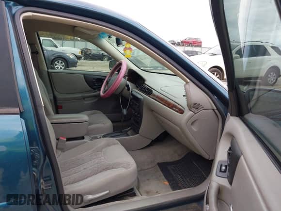 2003 Chevrolet Malibu LS z VIN 1G1NE52J43M679268, wystawiony jako IAAI lot #40734140 z przebiegiem 64 325 mil mil oraz . Historia ofert i sprzedaży dostępna na DreamBid. Obrazek 5.