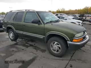 2001 Chevrolet Blazer LT z VIN 1GNDT13W21K240291, wystawiony jako Copart lot #76192674 z przebiegiem 227 111 mil mil oraz Szkoda całkowita • Salvage title. Historia ofert i sprzedaży dostępna na DreamBid. Obrazek 4.