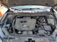 ✅ 2014 Mazda CX-5 Sport • VIN: JM3KE2BE0E0335126 • Lot: 56555315. Listed on Copart with 116,718 mi. Free auction sales archive from the USA and detailed vehicle history report at DreamBid. Image 12.