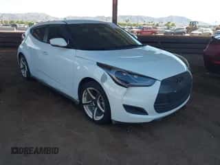 2016 Hyundai Veloster z VIN KMHTC6ADXGU288262, wystawiony jako IAAI lot #43321265 z przebiegiem 126 802 mil mil oraz . Historia ofert i sprzedaży dostępna na DreamBid. Obrazek 1.