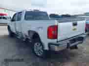 2013 Chevrolet Silverado 2500HD LTZ with VIN 1GC1KYCG7DF151006, listed as a IAAI auction lot 43263484 with 129,989 mi miles and . Bid and sale history available at DreamBid. Image 3.