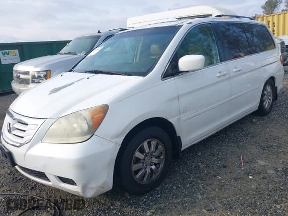 ✅ 2010 Honda Odyssey EX-L • VIN: 5FNRL3H68AB045019 • Lot: 43741404. Listed on IAAI with 248,212 mi. Free auction sales archive from the USA and detailed vehicle history report at DreamBid. Image 2.