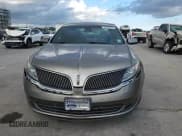 ✅ 2015 Lincoln MKS • VIN: 1LNHL9EK0FG606676 • Lot: 92029925. Listed on Copart with 79,333 mi. Free auction sales archive from the USA and detailed vehicle history report at DreamBid. Image 13.