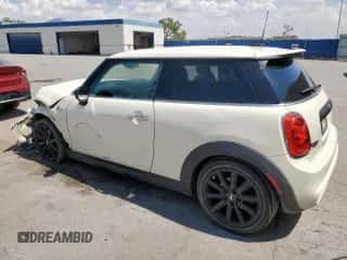 2015 MINI Hardtop S with VIN WMWXP7C56F2A58203, listed as a Copart auction lot 62602855 with 101,679 mi miles and Salvage title. Bid and sale history available at DreamBid. Image 2.