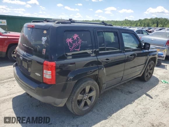 ✅ 2015 Jeep Patriot Latitude • VIN: 1C4NJPFA5FD107297 • Lot: 55774155. Listed on Copart with 144,240 mi. Free auction sales archive from the USA and detailed vehicle history report at DreamBid. Image 3.