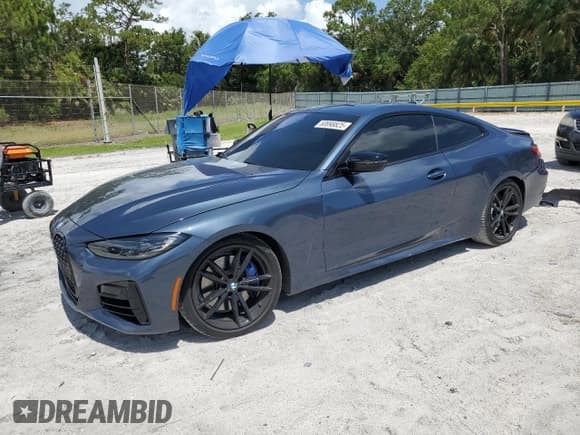 ✅ 2022 BMW 4 Series M440i • VIN: WBA83AP03NCJ36230 • Lot: 60898825. Listed on Copart with 24,718 mi. Free auction sales archive from the USA and detailed vehicle history report at DreamBid. Image 1.