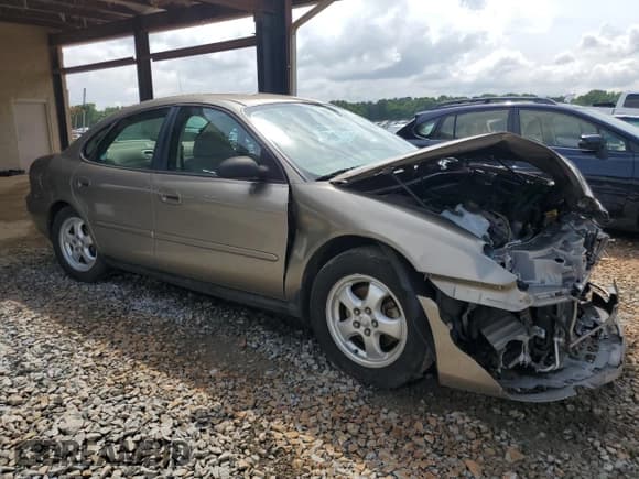 ✅ 2004 Ford Taurus SE • VIN: 1FAFP532X4A192520 • Lot: 54305335. Listed on Copart with Not provided. Free auction sales archive from the USA and detailed vehicle history report at DreamBid. Image 4.