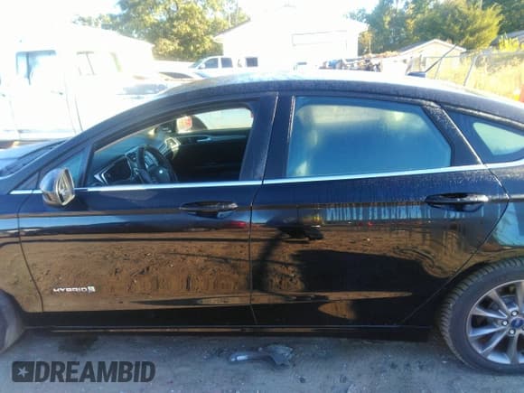 ✅ 2017 Ford Fusion Hybrid SE • VIN: 3FA6P0LU0HR381693 • Lot: 43386438. Listed on IAAI with 127,284 mi. Free auction sales archive from the USA and detailed vehicle history report at DreamBid. Image 14.