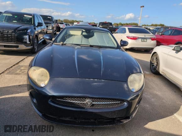 ✅ 2007 Jaguar XK • VIN: SAJWA43B075B09846 • Lot: 76014244. Listed on Copart with Not provided. Free auction sales archive from the USA and detailed vehicle history report at DreamBid. Image 5.