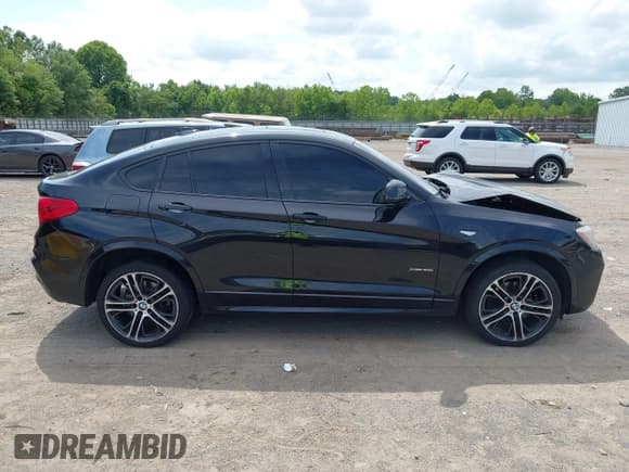✅ 2016 BMW X4 xDrive35i • VIN: 5UXXW5C59G0N91651 • Lot: 42516230. Wystawiony na IAAI z przebiegiem 115 016 mil. Bezpłatny archiwum sprzedaży aukcyjnych z USA i szczegółowy raport historii pojazdu na DreamBid. Zdjęcie 13.