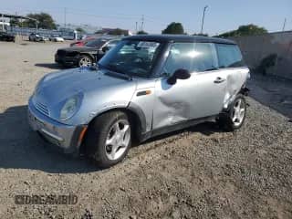 2003 MINI Hardtop with VIN WMWRC33473TE17424, listed as a Copart auction lot 68163985 with 138,600 mi miles and Salvage title. Bid and sale history available at DreamBid. Image 1.