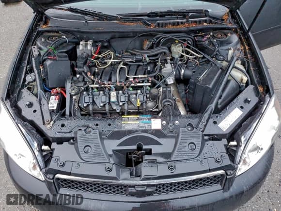 ✅ 2006 Chevrolet Impala SS • VIN: 2G1WD58C569349043 • Лот: 95213035. Опубликован ранее на Copart с пробегом 169 410 миль. Бесплатный доступ к архиву аукционных продаж из США и подробный отчёт об истории автомобиля на DreamBid. Изображение 11.