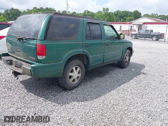 ✅ 1999 Oldsmobile Bravada • VIN: 1GHDT13W7X2709399 • Lot: 42615055. Wystawiony na IAAI z przebiegiem 194 791 mil. Bezpłatny archiwum sprzedaży aukcyjnych z USA i szczegółowy raport historii pojazdu na DreamBid. Zdjęcie 4.