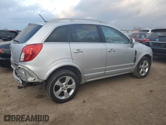 2015 Chevrolet Captiva Sport LT z VIN 3GNAL3EK9FS503168, wystawiony jako Copart lot #82699684 z przebiegiem 127 599 mil mil oraz Szkoda całkowita • Salvage title. Historia ofert i sprzedaży dostępna na DreamBid. Obrazek 3.