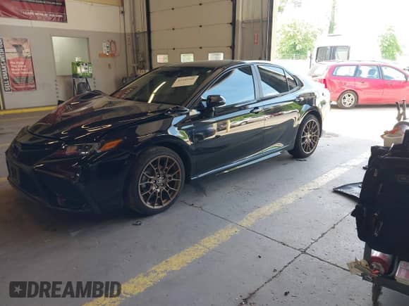 2023 Toyota Camry SE with VIN 4T1G11BK4PU088615, listed as a IAAI auction lot 42345340 with 35,468 mi miles and . Bid and sale history available at DreamBid. Image 2.