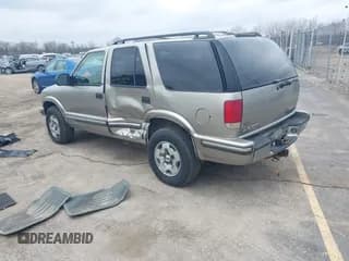 ✅ 1999 Chevrolet Blazer LT • VIN: 1GNDT13W3X2250496 • Lot: 42001807. Wystawiony na IAAI z przebiegiem 210 193 mil. Bezpłatny archiwum sprzedaży aukcyjnych z USA i szczegółowy raport historii pojazdu na DreamBid. Zdjęcie 3.