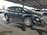 ✅ 2012 Mazda CX-7 i Touring • VIN: JM3ER2CM1C0421615 • Lot: 50592295. Wystawiony na Copart z przebiegiem 83 955 mil. Bezpłatny archiwum sprzedaży aukcyjnych z USA i szczegółowy raport historii pojazdu na DreamBid. Zdjęcie 4.