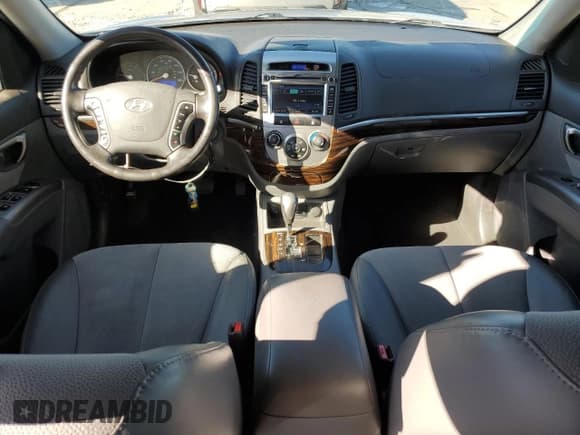 ✅ 2012 Hyundai Santa Fe Limited • VIN: 5XYZHDAG8CG120419 • Lot: 64593604. Listed on Copart with 94,740 mi. Free auction sales archive from the USA and detailed vehicle history report at DreamBid. Image 8.