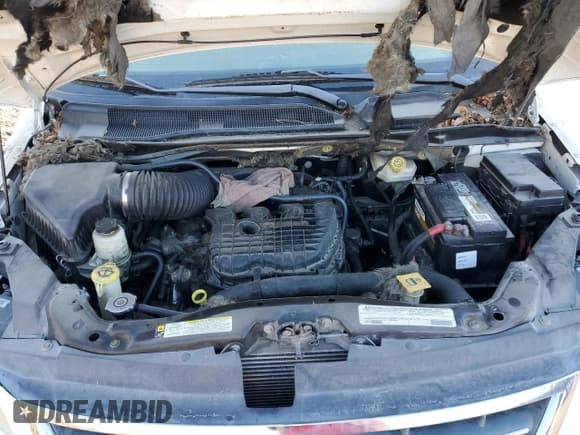 ✅ 2012 Volkswagen Routan SE • VIN: 2C4RVABG4CR293887 • Lot: 41596715. Listed on Copart with 114,441 mi. Free auction sales archive from the USA and detailed vehicle history report at DreamBid. Image 24.