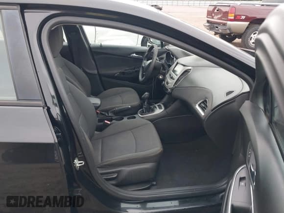 ✅ 2018 Chevrolet Cruze LS • VIN: 1G1BB5SM4J7116996 • Lot: 43534133. Listed on IAAI with 204,194 mi. Free auction sales archive from the USA and detailed vehicle history report at DreamBid. Image 5.