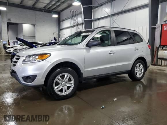 2012 Hyundai Santa Fe GLS with VIN 5XYZGDAB8CG119715, listed as a Copart auction lot 61458234 with 140,378 mi miles and Salvage title. Bid and sale history available at DreamBid. Image 1.