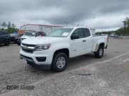 ✅ 2015 Chevrolet Colorado 2WD WT • VIN: 1GCHSAEA6F1145115 • Лот: 43451043. Опубликован ранее на IAAI с пробегом 241 430 миль. Бесплатный доступ к архиву аукционных продаж из США и подробный отчёт об истории автомобиля на DreamBid. Изображение 2.