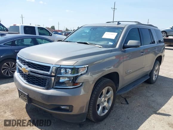 ✅ 2019 Chevrolet Tahoe LT • VIN: 1GNSKBKC6KR165031 • Lot: 42693802. Listed on IAAI with 119,883 mi. Free auction sales archive from the USA and detailed vehicle history report at DreamBid. Image 2.