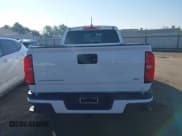 ✅ 2021 Chevrolet Colorado 2WD Work Truck • VIN: 1GCGSBENXM1276176 • Lot: 41871871. Listed on IAAI with 11,368 mi. Free auction sales archive from the USA and detailed vehicle history report at DreamBid. Image 16.