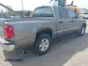 2006 Dodge Dakota SLT with VIN 1D7HE48N06S580705, listed as a IAAI auction lot 42120728 with 206,420 mi miles and . Bid and sale history available at DreamBid. Image 4.