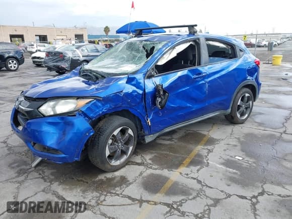 ✅ 2018 Honda HR-V EX • VIN: 3CZRU5H54JM700492 • Lot: 43302646. Listed on IAAI with 73,768 mi. Free auction sales archive from the USA and detailed vehicle history report at DreamBid. Image 2.