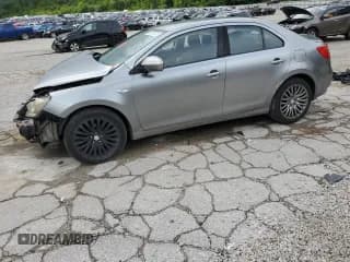 ✅ 2012 Suzuki Kizashi SE • VIN: JS2RF9A35C6101304 • Лот: 60977375. Опубликован ранее на Copart с пробегом 158 968 миль. Бесплатный доступ к архиву аукционных продаж из США и подробный отчёт об истории автомобиля на DreamBid. Изображение 1.