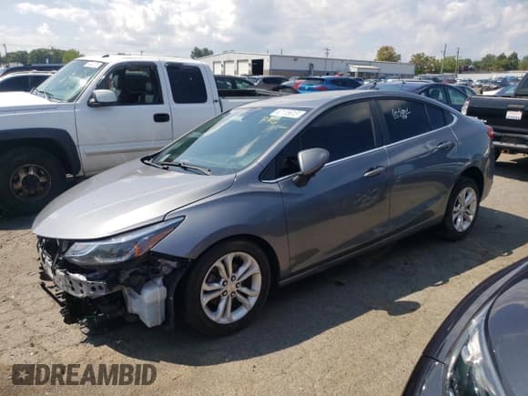 ✅ 2019 Chevrolet Cruze LT • VIN: 1G1BE5SM7K7135468 • Lot: 62115613. Listed on Copart with 87,482 mi. Free auction sales archive from the USA and detailed vehicle history report at DreamBid. Image 1.