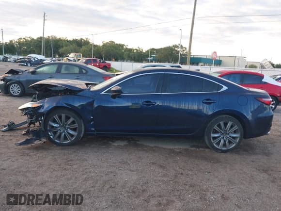 ✅ 2018 Mazda 6 Grand Touring • VIN: JM1GL1TYXJ1317857 • Lot: 43148472. Listed on IAAI with 80,336 mi. Free auction sales archive from the USA and detailed vehicle history report at DreamBid. Image 15.