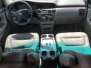 ✅ 2004 Honda Odyssey EX-L • VIN: 5FNRL18014B019060 • Лот: 66083295. Опубликован ранее на Copart с пробегом 174 121 миль. Бесплатный доступ к архиву аукционных продаж из США и подробный отчёт об истории автомобиля на DreamBid. Изображение 8.