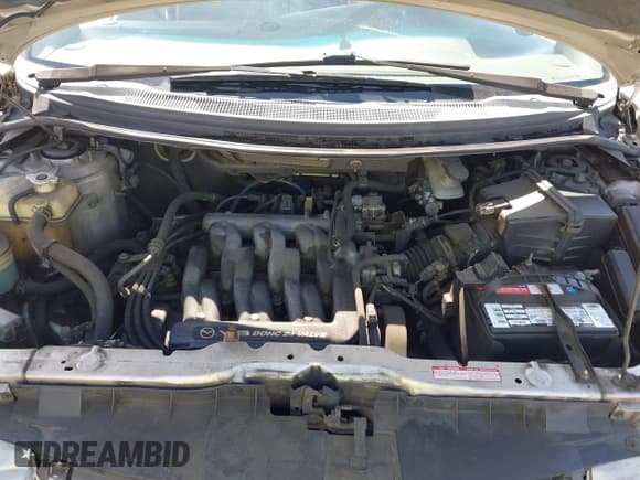 ✅ 2000 Mazda MPV DX • VIN: JM3LW28G7Y0138419 • Лот: 41989872. Опубликован ранее на IAAI с пробегом 185 764 миль. Бесплатный доступ к архиву аукционных продаж из США и подробный отчёт об истории автомобиля на DreamBid. Изображение 10.