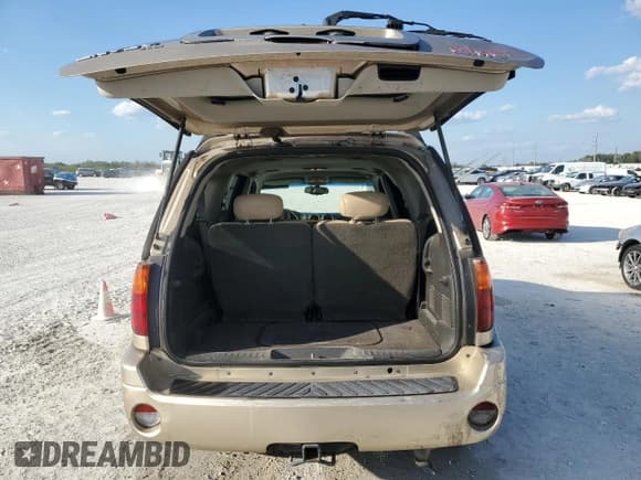 ✅ 2006 GMC Envoy SLE • VIN: 1GKES16S366100814 • Lot: 45897285. Wystawiony na Copart z przebiegiem 179 551 mil. Bezpłatny archiwum sprzedaży aukcyjnych z USA i szczegółowy raport historii pojazdu na DreamBid. Zdjęcie 6.