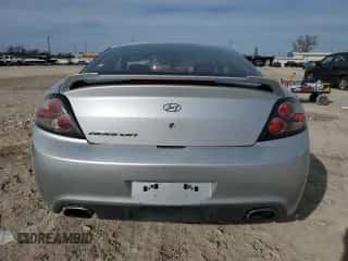 2008 Hyundai Tiburon GS z VIN KMHHM66D68U296212, wystawiony jako Copart lot #88536725 z przebiegiem 116 240 mil mil oraz Szkoda całkowita • Salvage title. Historia ofert i sprzedaży dostępna na DreamBid. Obrazek 6.