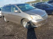 ✅ 2006 Honda Odyssey EX-L • VIN: 5FNRL386X6B409125 • Lot: 43513745. Listed on IAAI with Not provided. Free auction sales archive from the USA and detailed vehicle history report at DreamBid. Image 1.