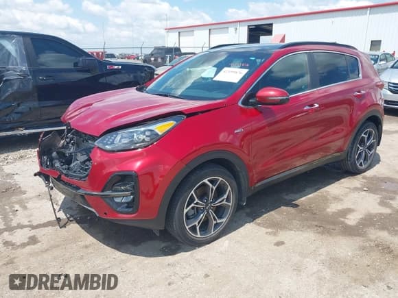 ✅ 2020 Kia Sportage SX Turbo • VIN: KNDPRCA62L7667804 • Lot: 42199876. Listed on IAAI with 33,265 mi. Free auction sales archive from the USA and detailed vehicle history report at DreamBid. Image 2.