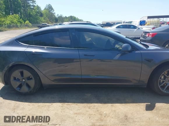 ✅ 2022 Tesla Model 3 Long Range • VIN: 5YJ3E1EB2NF335641 • Lot: 42044108. Listed on IAAI with 47,505 mi. Free auction sales archive from the USA and detailed vehicle history report at DreamBid. Image 13.